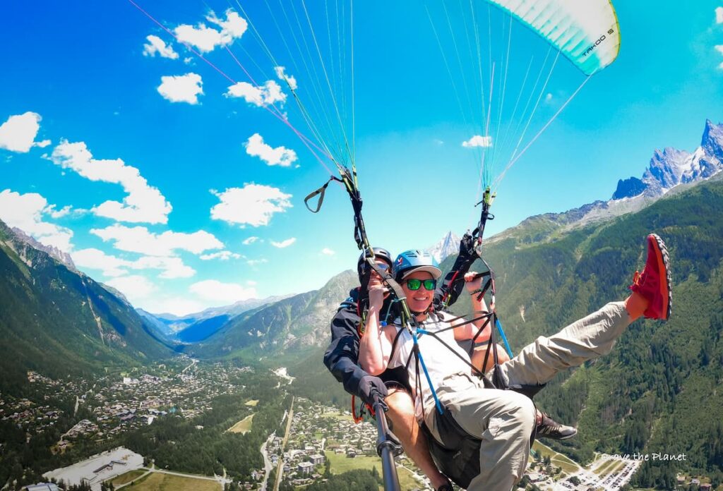 woman paragliding by mont blanc