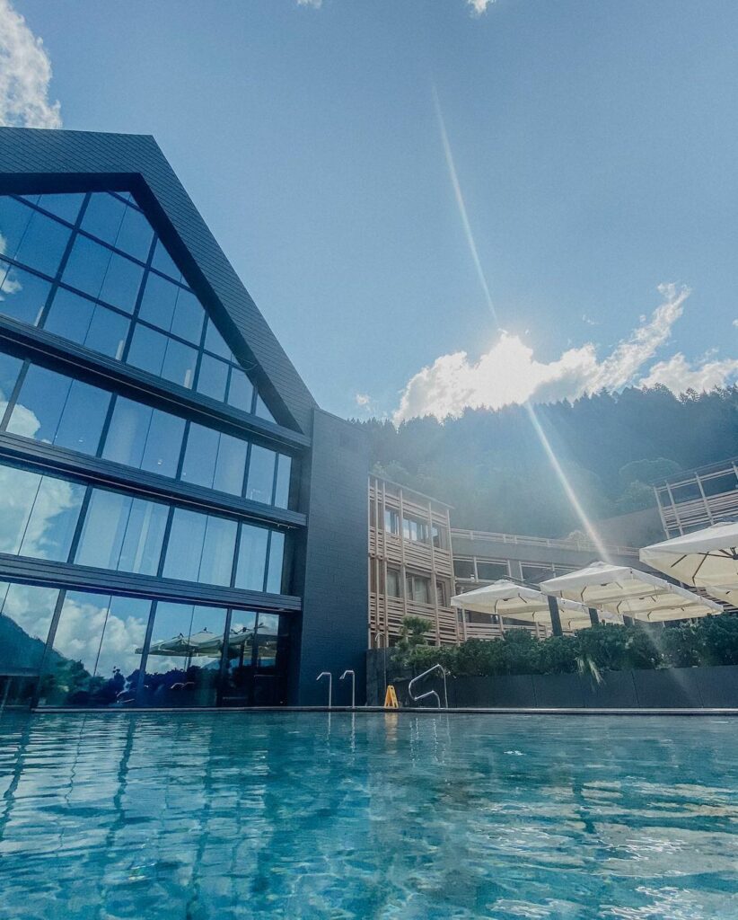 hotel with outdoor pool in dolomites