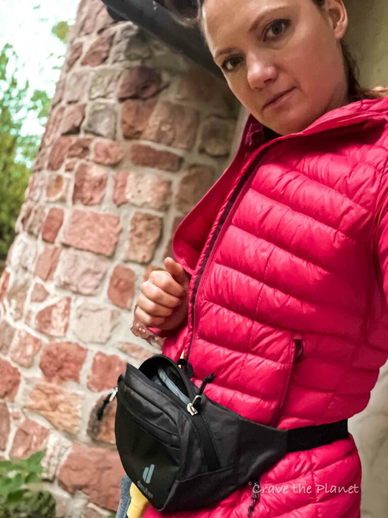 woman wearing. a hiking fanny pack