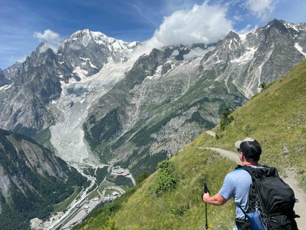 man hiking on the tour du mont blanc