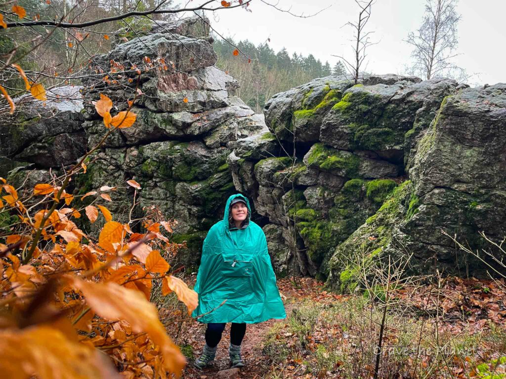 woman hiking near devils rock in germany 