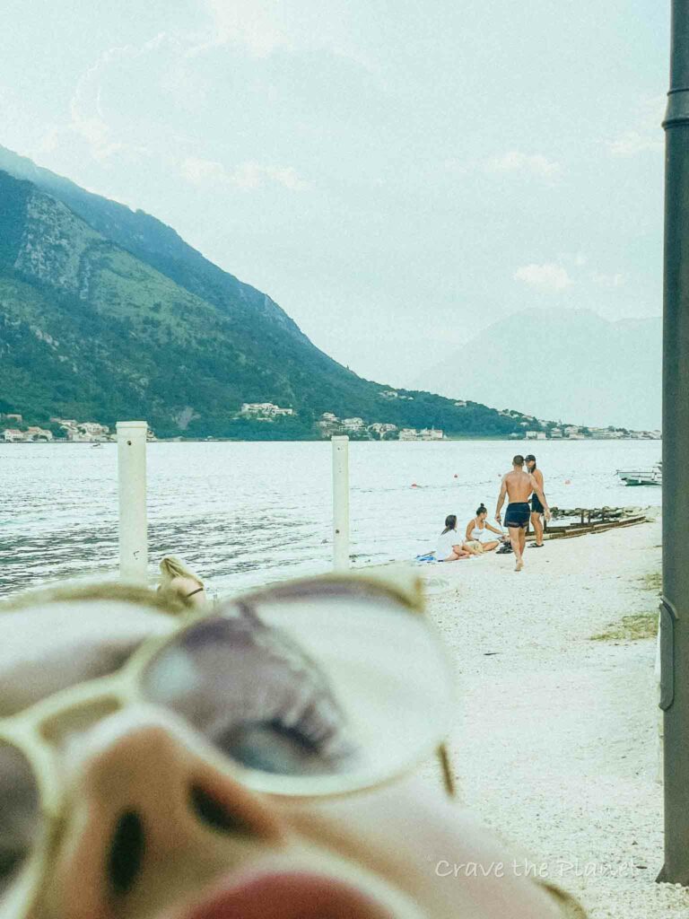 teenager in montenegro at beach in kotor